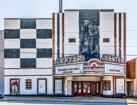 Lenoir, NC, USA-24 Sept 2019: The old Center Theater in downtown Lenoir sets abandoned and deteriorating.