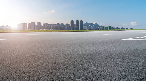 istock Skyline of road surface and urban architectural landscape 1178460425