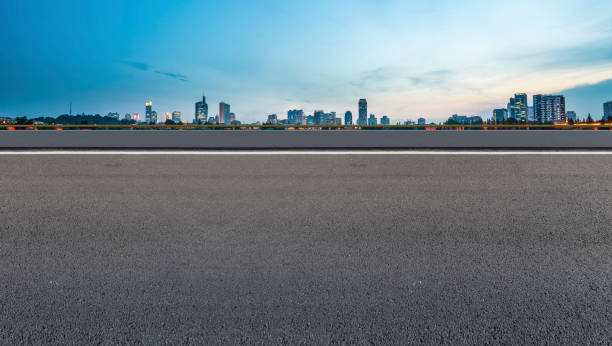istock Skyline of road surface and urban architectural landscape 1178462331