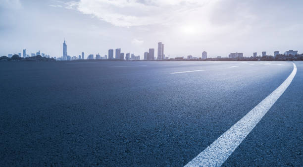 istock Skyline of road surface and urban architectural landscape 1178462341