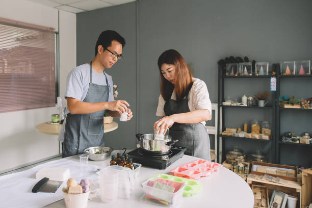 istock 2 asian chinese female and male working on handmade soap making workshop in a studio 1178463427