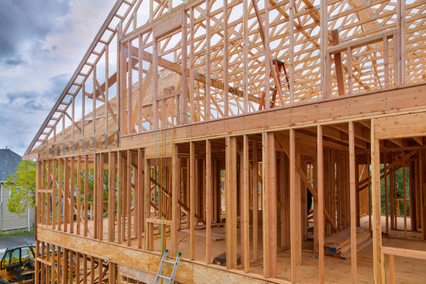 istock Beam stick built frame of a new house under construction 1178464323