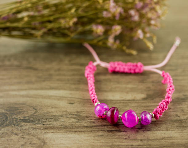 istock Pink cord bracelet 1178466061