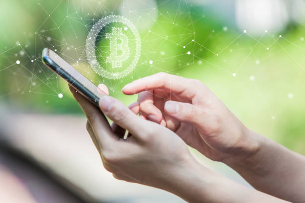 Bitcoin Symbol Floating on Smart Phone Screen