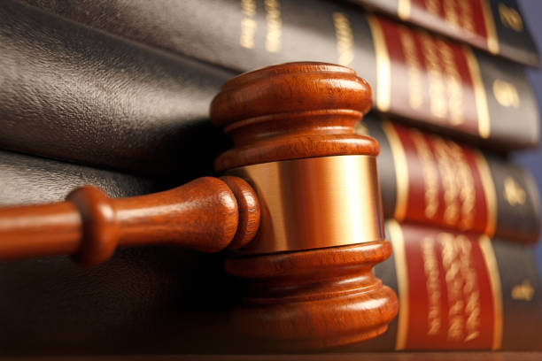istock Gavel Resting Next To A Stack Of Law Books 1178467013
