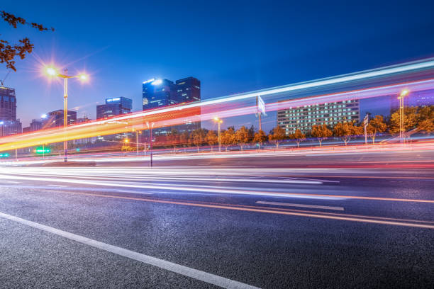 istock the light trails on the modern building background 1178467134