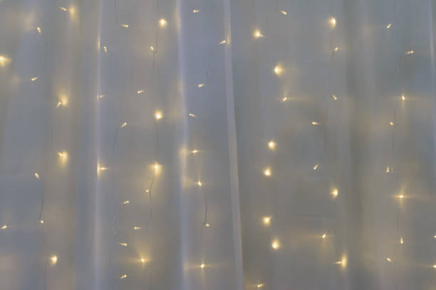 istock led light wall garland on white tulle fabric backdrop 1178469450