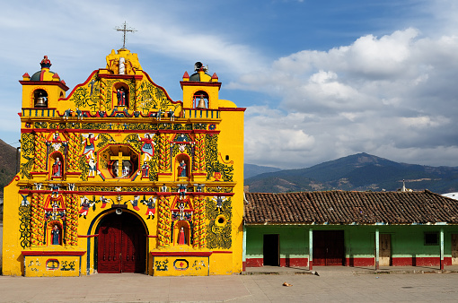 The most colour facade of the church in the San Andres Xecul village in Guatemala, Central America