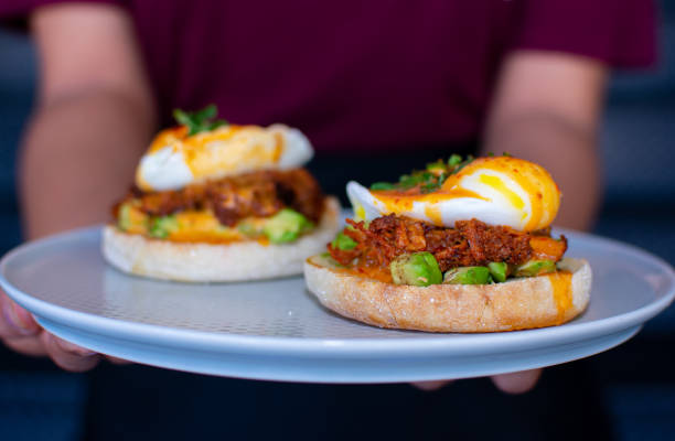 istock Mexican eggs benedictos brunch style with orange juice 1178480230