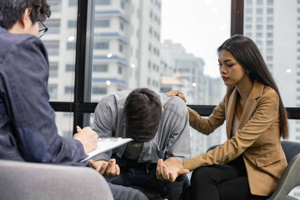istock Couple talking, help and giving support by psychiatrist. 1178483136