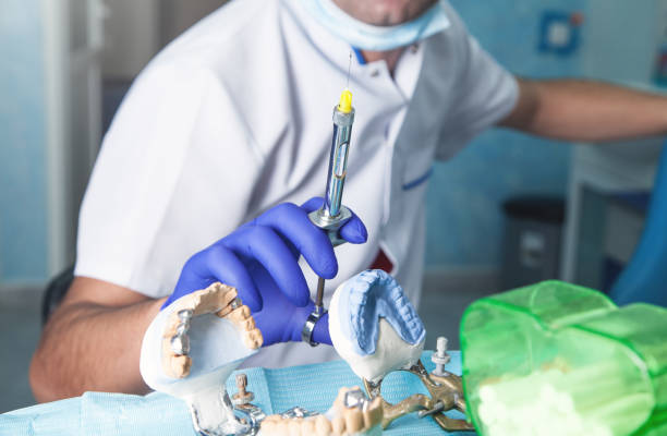 istock Dentist holding syringe in the dental office. 1178487659