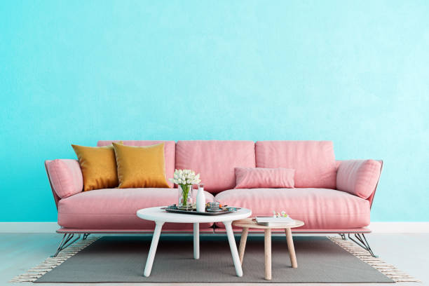 istock Living room light blue interior wall mock up with millennial pink sofa, empty white wall with free space above on top, 3D render, 3D illustration 1178488695