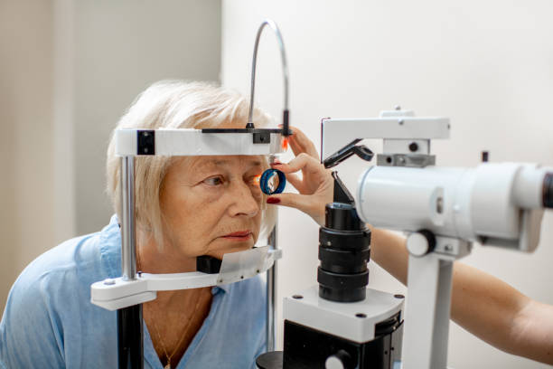 Senior woman during a medical eye examination Senior woman during a medical eye examination with microscope in the ophthalmologic office glaucoma photos stock pictures, royalty-free photos & images