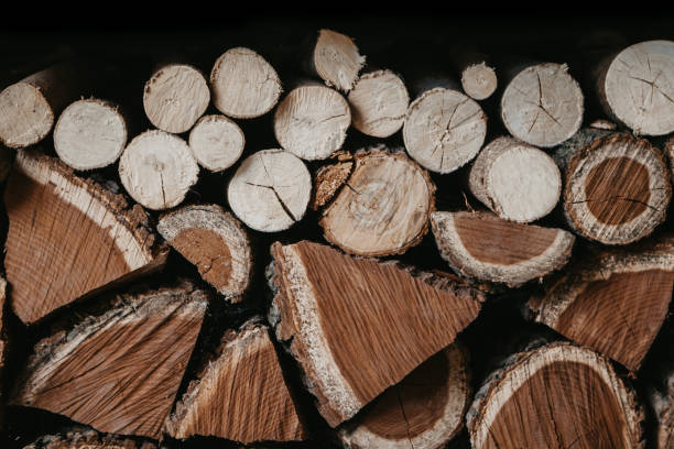 istock Chopped firewood stacked in two layers 1178489928