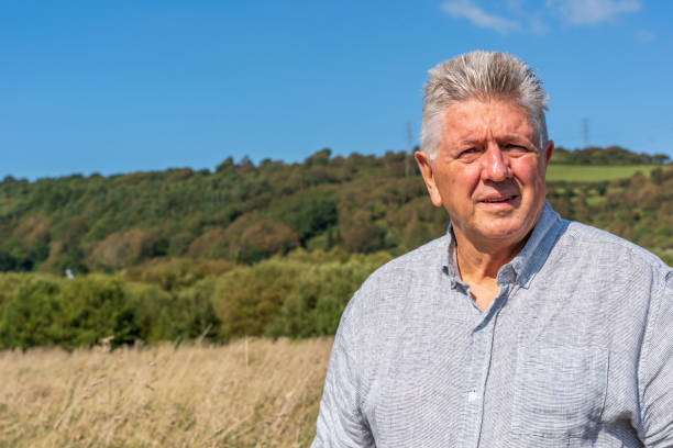 istock Senior Caucasian man on grassy bank 1178489945