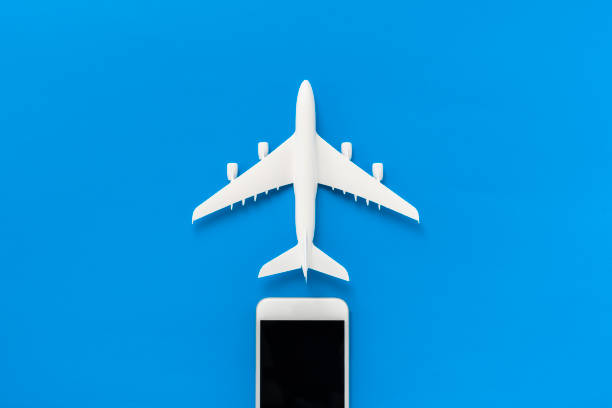 istock Miniature airplane and smartphone 1178489954