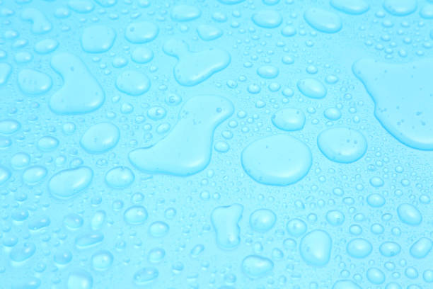 istock Close up water drops on blue background, Water drop in macro photography 1178497110