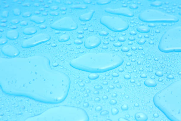 istock Close up water drops on blue background, Water drop in macro photography 1178497111