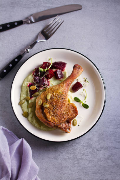 istock Roasted duck with celeriac puree and beetroot, sprinkled with pumpkin seeds 1178497194