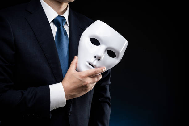 istock Man in suit and mask 1178499670