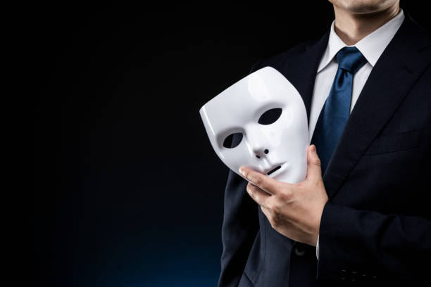istock Man in suit and mask 1178499718