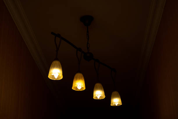 istock Beautiful Chandelier Backgrounds. Modern chandelier hanging under ceiling 1178500985