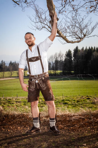 istock bavarian tradition man in the grass 1178501173