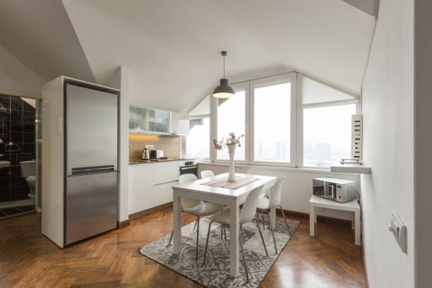 istock Kitchen interior with dining area in a loft apartment 1178501917