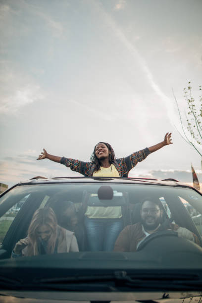 istock Black woman enjoying in car ride 1178502549