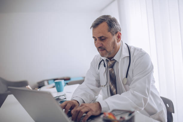 istock The doctor works in his office 1178503633