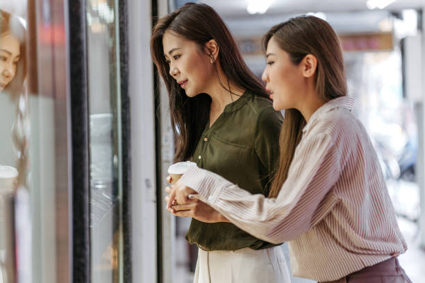 istock Two young women shopping in mall 1178504647