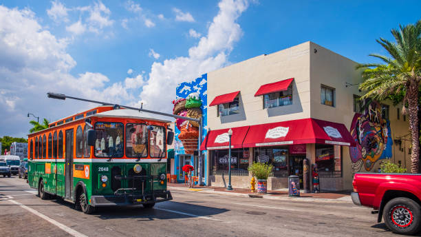 Florida (US) - Miami, Little Havana - Calle Ocho Calle Ocho (8th Street) is the main street and the beating heart of Little Havana, one of the most famous neighborhoods of Miami, Florida. People. trolley bus stock pictures, royalty-free photos & images