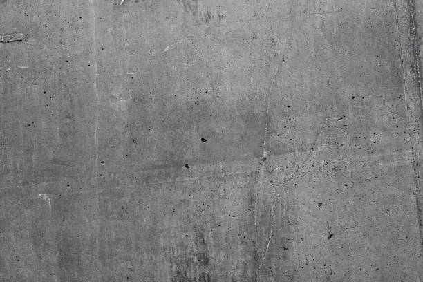 szara, teksturowana betonowa ściana zewnętrzna - concret zdjęcia i obrazy z banku zdjęć