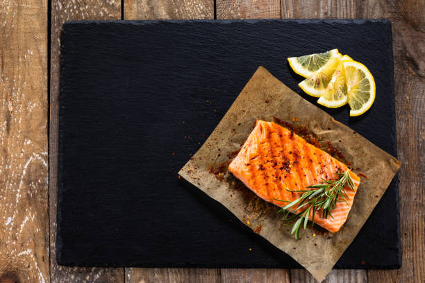 istock Roasted salmon steak on stone plate 1178508944