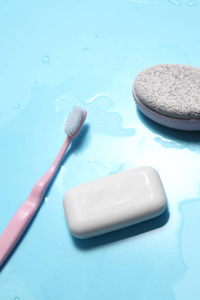 istock shower accessories on blue background with a blank space for a text, shower accessories in top view 1178508970