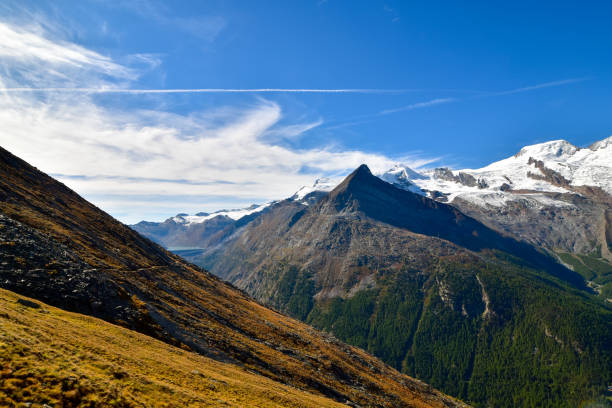 istock Idyllic landscape in the Alps with snow-capped mountain peaks. 1178510149