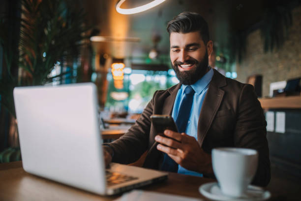 istock Business man drinking coffee in a cafe 1178511232