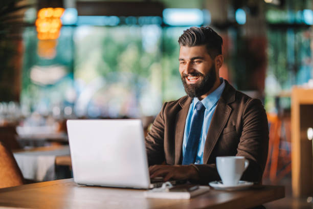 istock Business man drinking coffee in a cafe 1178511592