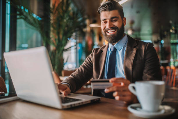 istock Business man drinking coffee in a cafe 1178511690