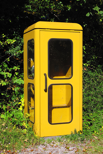 Elizabethan Telephone box in the village of Haworth, Yorkshire, England.