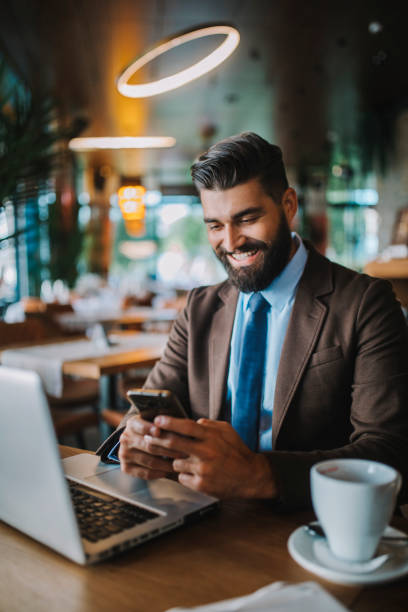 istock Business man drinking coffee in a cafe 1178512657