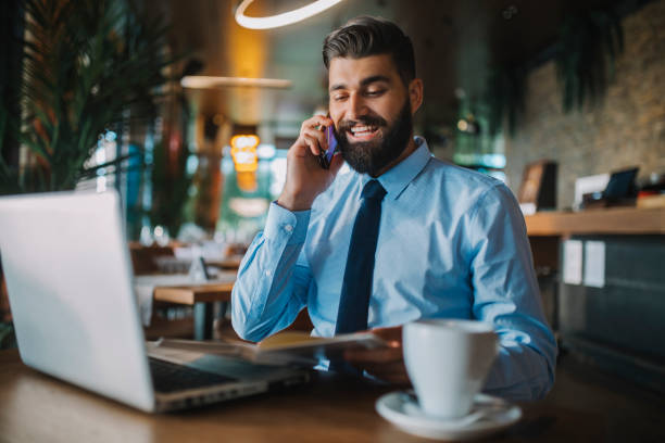 istock Business man drinking coffee in a cafe 1178512719