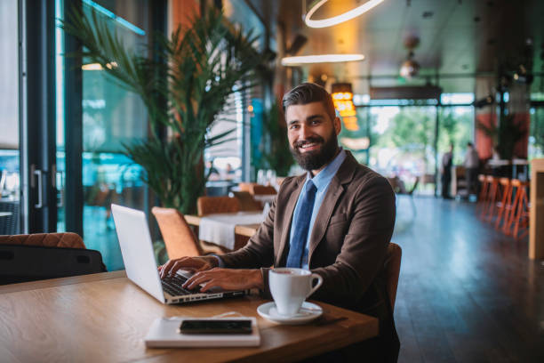 istock Business man drinking coffee in a cafe 1178512757