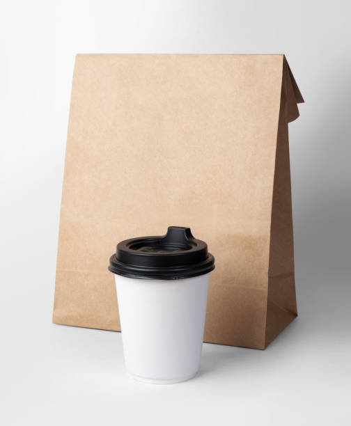 istock Paper bag and coffee cup isolated on white background with clipping path 1178512774