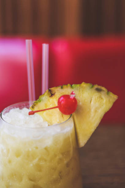 istock Cocktail with a wooden background 1178513891