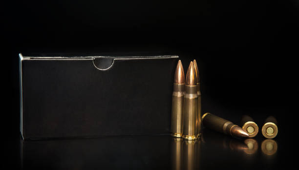 istock Bullet isolated on black background with reflexion. Rifle bullets close-up on black back. Cartridges for rifle and carbine on a black. 1178515244