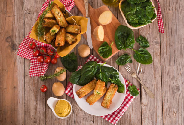 Potato croquettes with spinach and mozzarella.