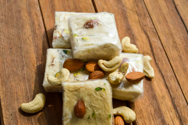 istock Sonpapdi sweet on wooden table ,sohan halwa 1178516459