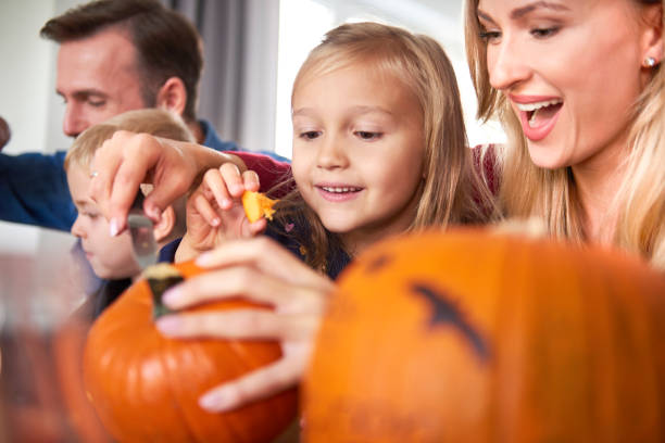 istock Happy family preparing to Halloween 1178517517