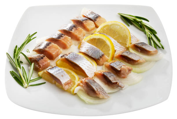 istock Fillet herring with rosemary, onion and lemon 1178518011